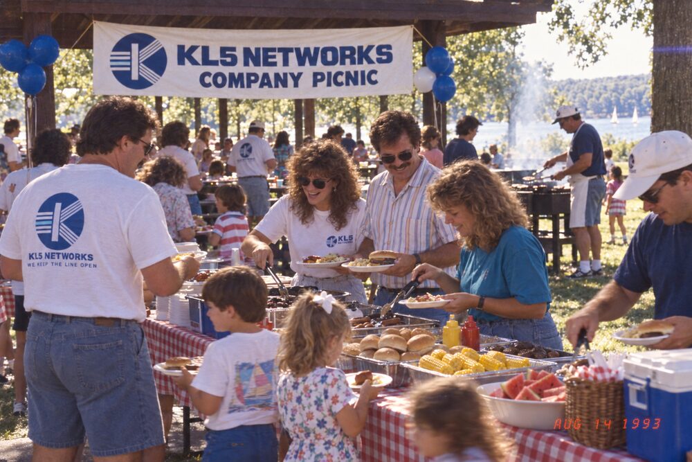 Staff serving at the buffet table