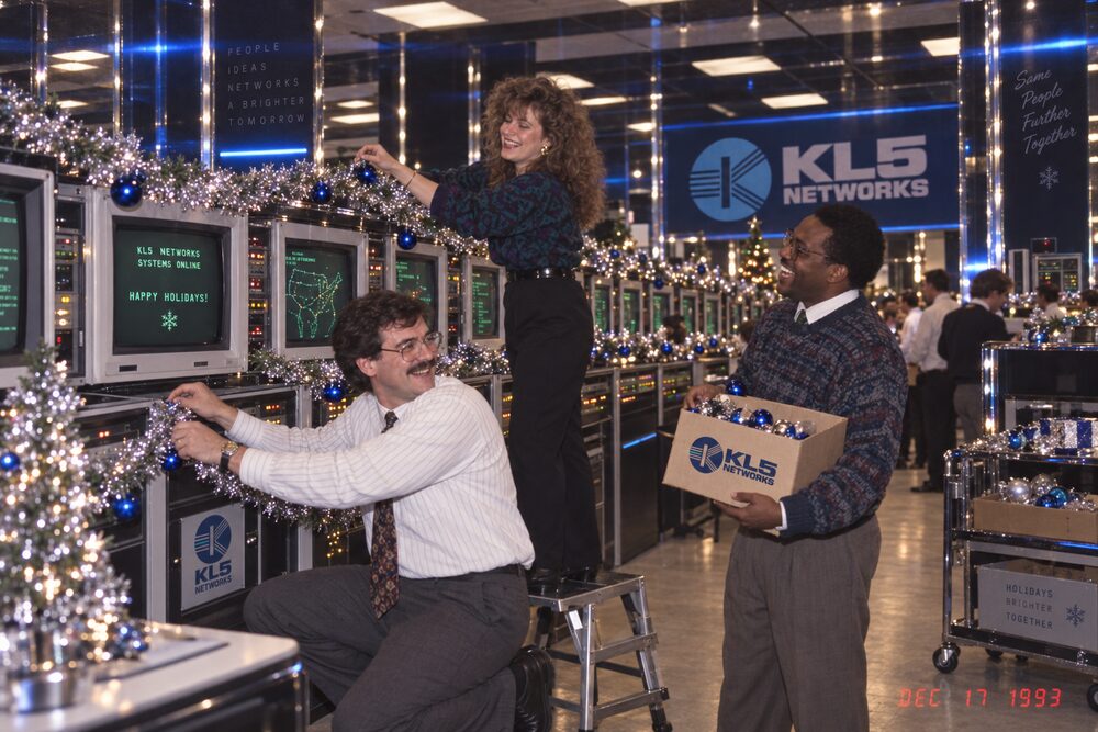 Staff hanging garlands over the equipment